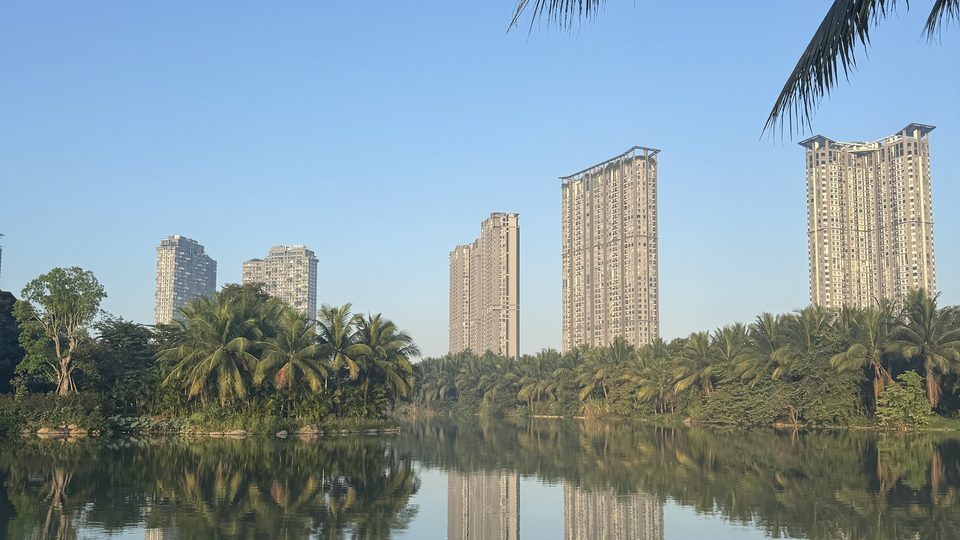 Lake reflecting the towers in the morning